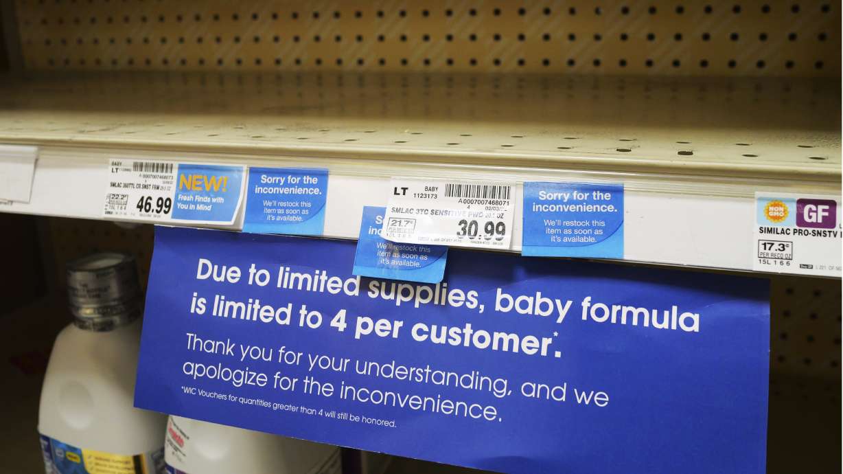 A due to limited supplies sign is shown on the baby formula shelf at a grocery store Tuesday, May 10, in Salt Lake City. Parents across much of the U.S. are scrambling to find baby formula after a combination of supply disruptions and safety recalls have swept many of the leading brands off store shelves.