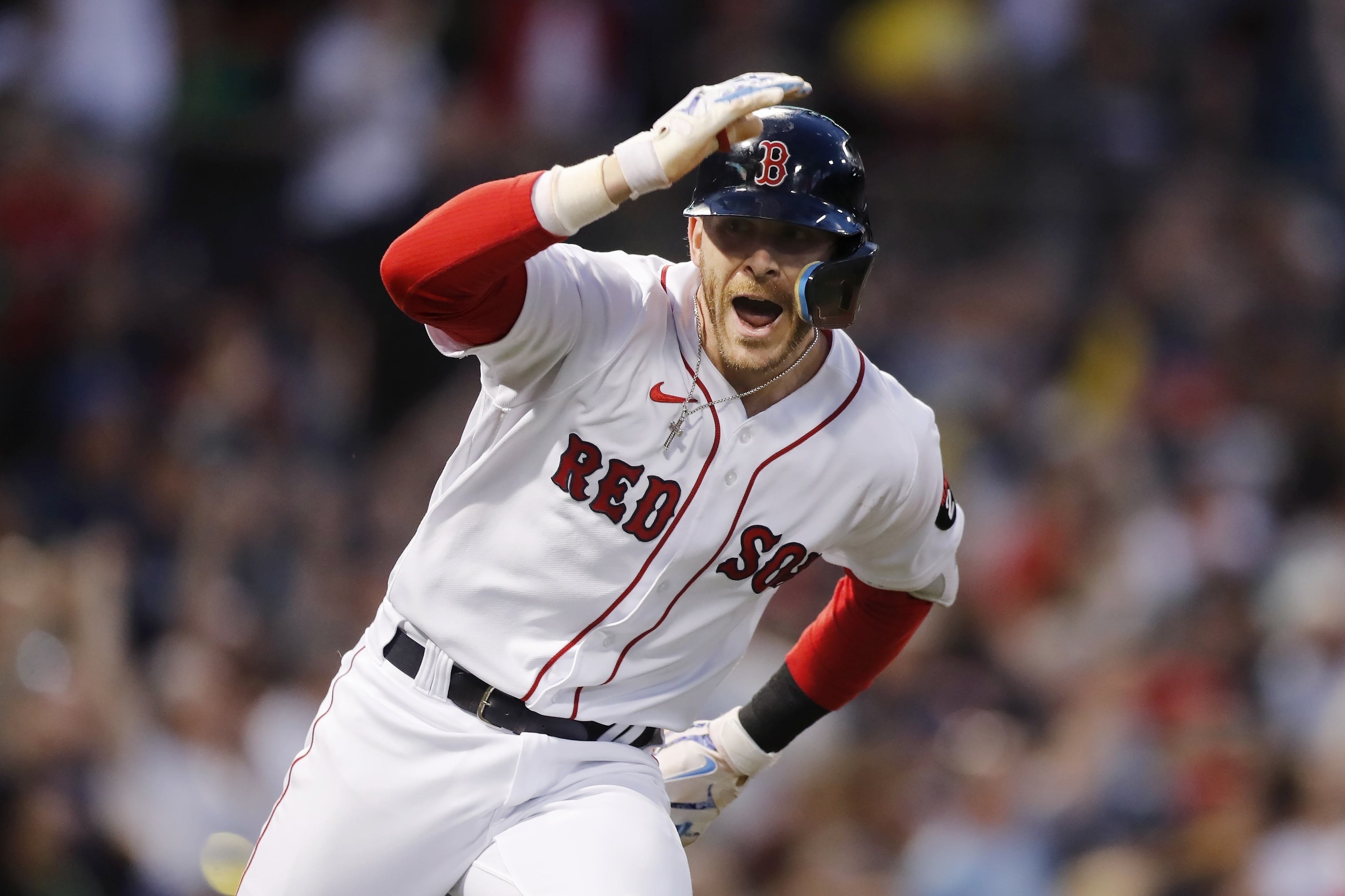 Boston Red Sox's Trevor Story looks to the dugout after hitting a grand slam against the Seattle Mariners during the third inning of a baseball game Friday, May 20, 2022, in Boston. 