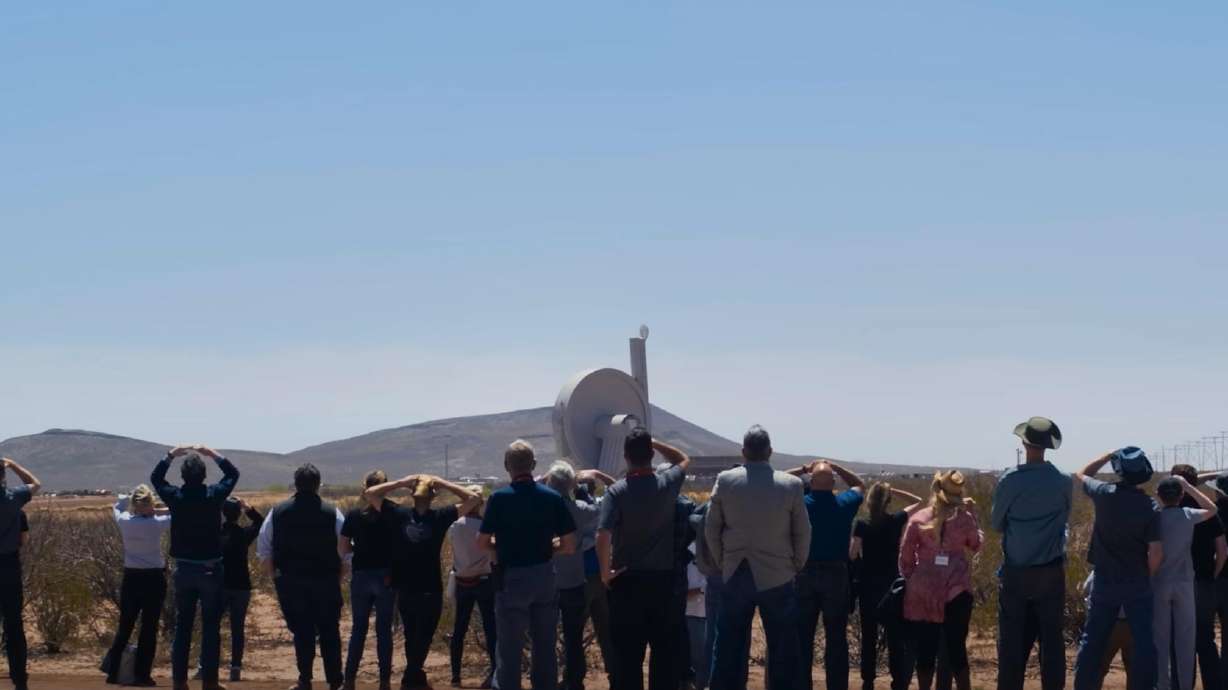 Spectators watch as a camera is launched into the air by SpinLaunch on April 22.