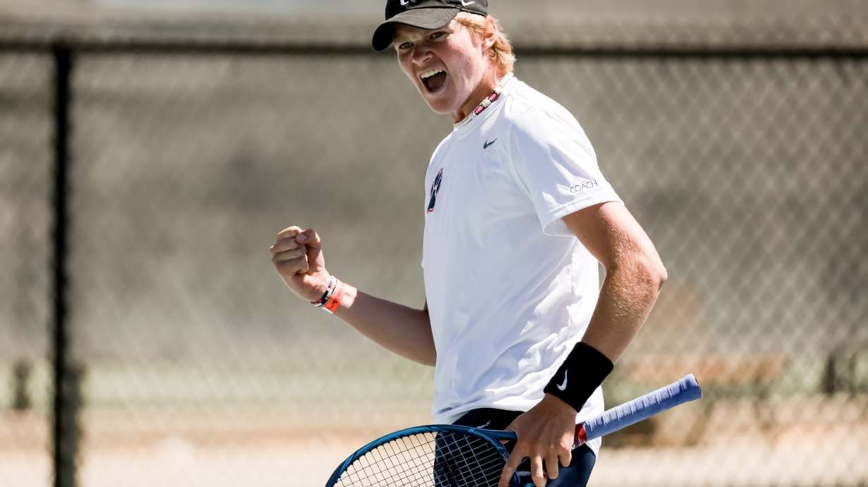 Hardy Owen of Brighton celebrates a point while playing against Jack Hinkle of Woods Cross in the 5A boys first singles tennis championship at Liberty Park in Salt Lake City on Saturday, May 21, 2022.