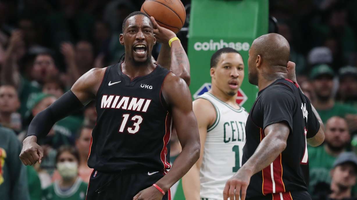 Miami Heat's Bam Adebayo (13) celebrates after scoring against the Boston Celtics during the second half of Game 3 of the NBA basketball playoffs Eastern Conference finals Saturday, May 21, 2022, in Boston.