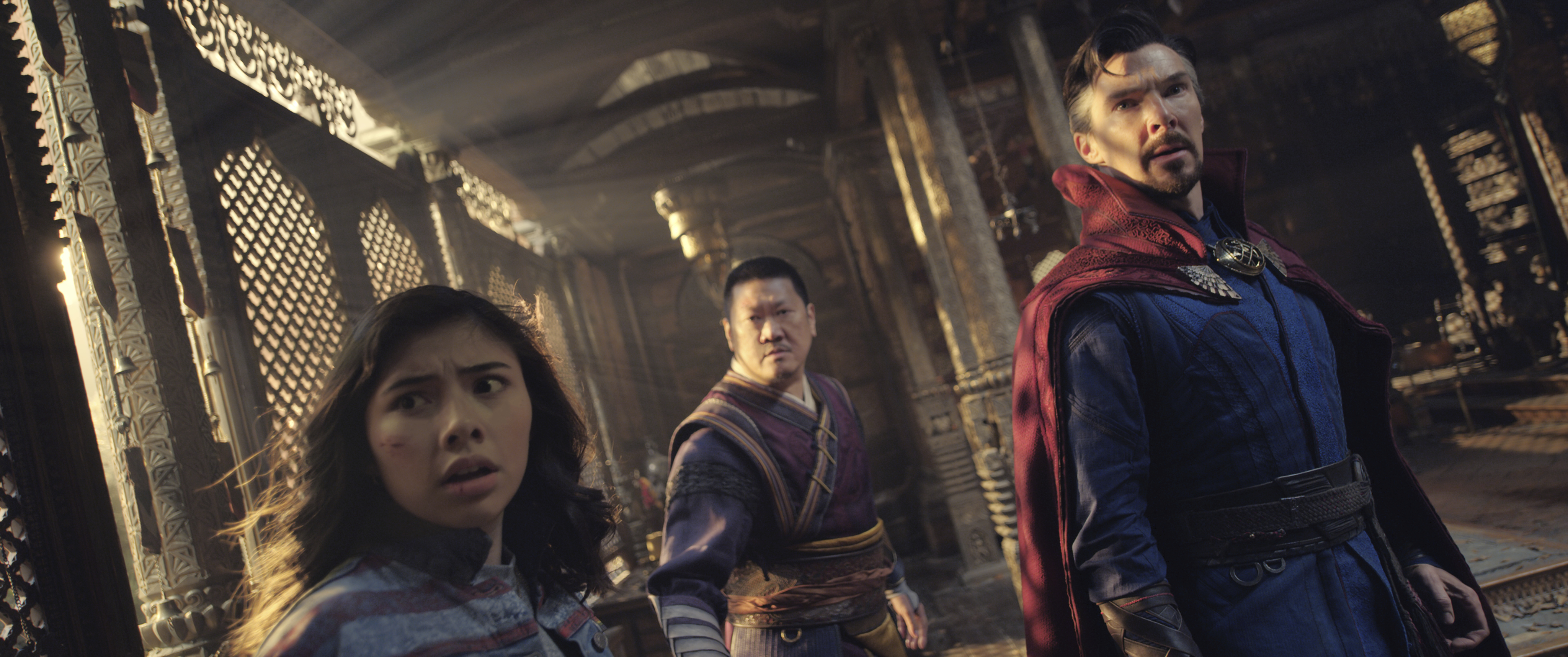 This image released by Marvel Studios shows, from left, Xochitl Gomez as America Chavez, Benedict Wong as Wong, and Benedict Cumberbatch as Dr. Stephen Strange in a scene from "Doctor Strange in the Multiverse of Madness."