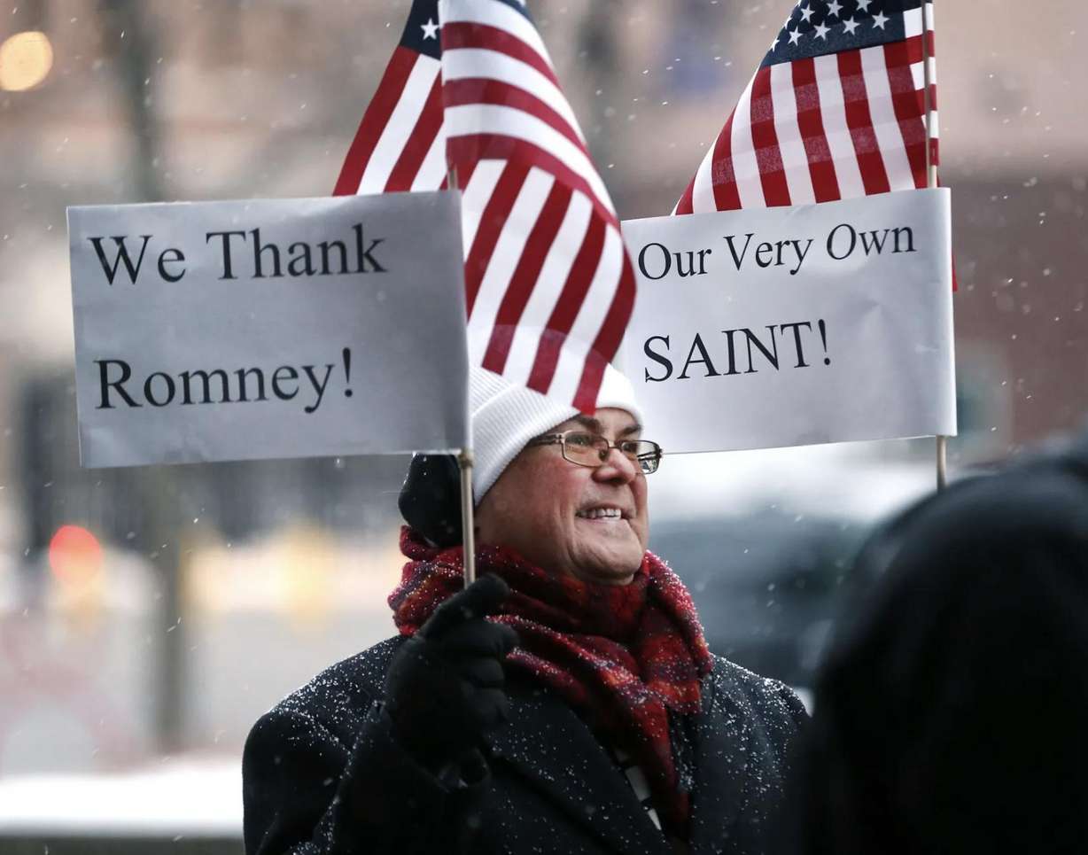 Jay McLeod holds a sign thanking Sen. Mitt Romney for his vote to convict then-President Donald Trump on one of the articles of impeachment during a rally outside of the Wallace F. Bennett Federal Building in Salt Lake City on Feb. 5, 2020. Romney’s Utah office is located in the building.