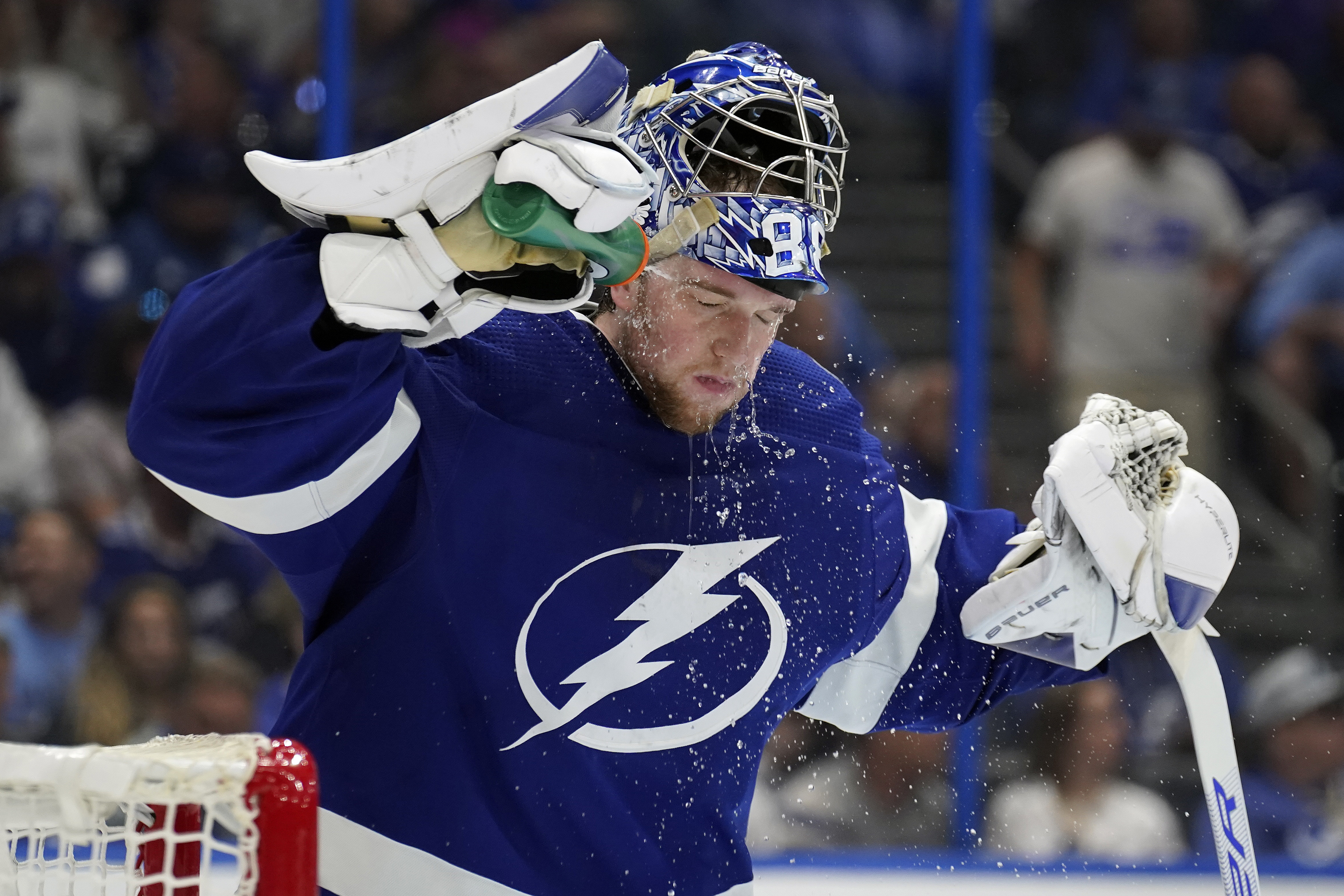 Tampa Bay Lightning goaltender Andrei Vasilevskiy (88) sprays water on his face during a timeout against the Florida Panthers during the third period in Game 4 of an NHL hockey second-round playoff series Monday, May 23, 2022, in Tampa, Fla. 
