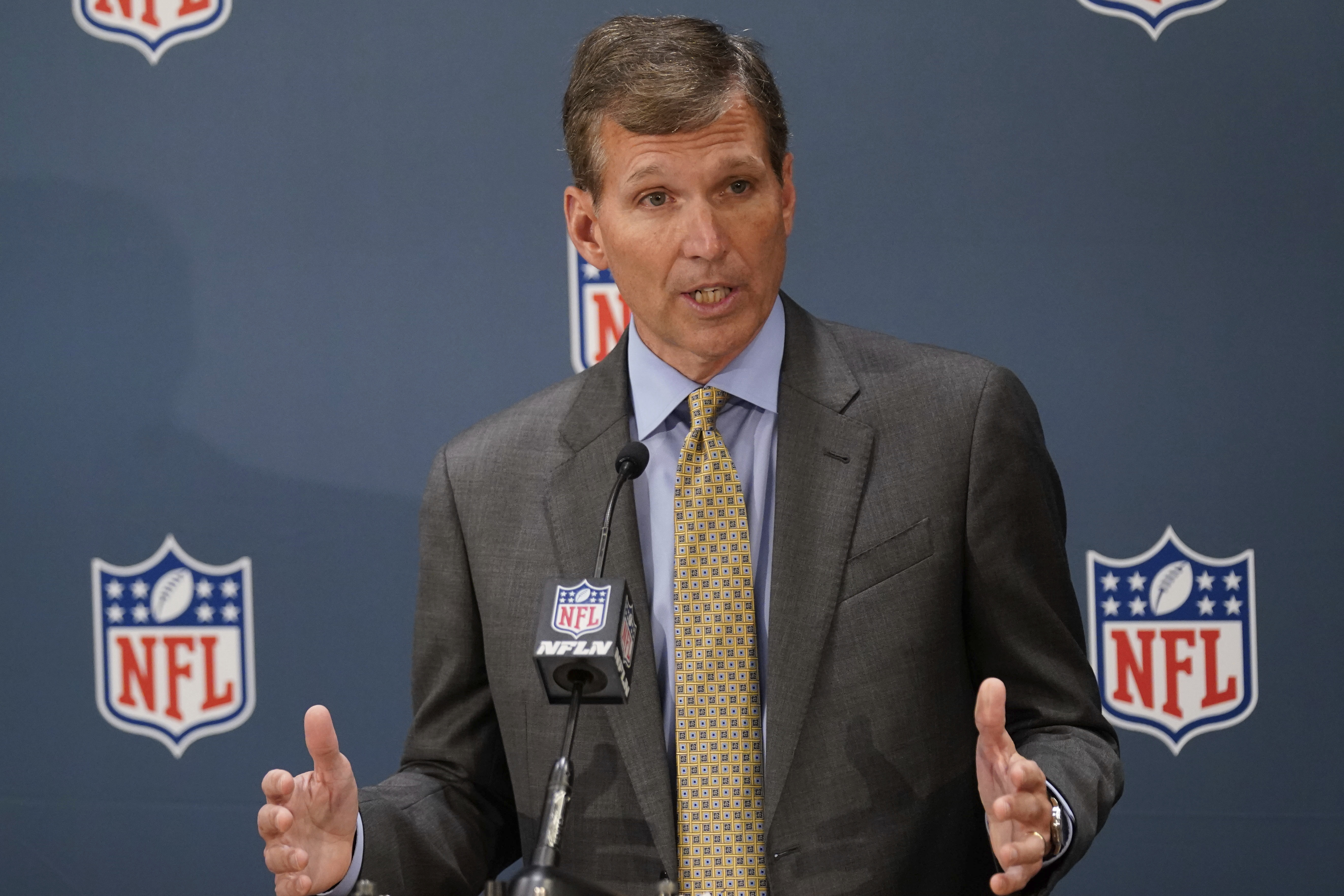 FILE - Dr. Allen Sills, Chief Medical Officer for the NFL, speaks to reporters during the NFL football owners meeting in New York, Tuesday, Oct. 26, 2021. Students from four Historically Black College and University medical schools will be selected for clinical rotations with NFL team medical staffs this year. “On the whole, a day would consist of a mixture of time with the athletic training staff, observing treatments and assessments and rehabilitation care,” said Sills. 