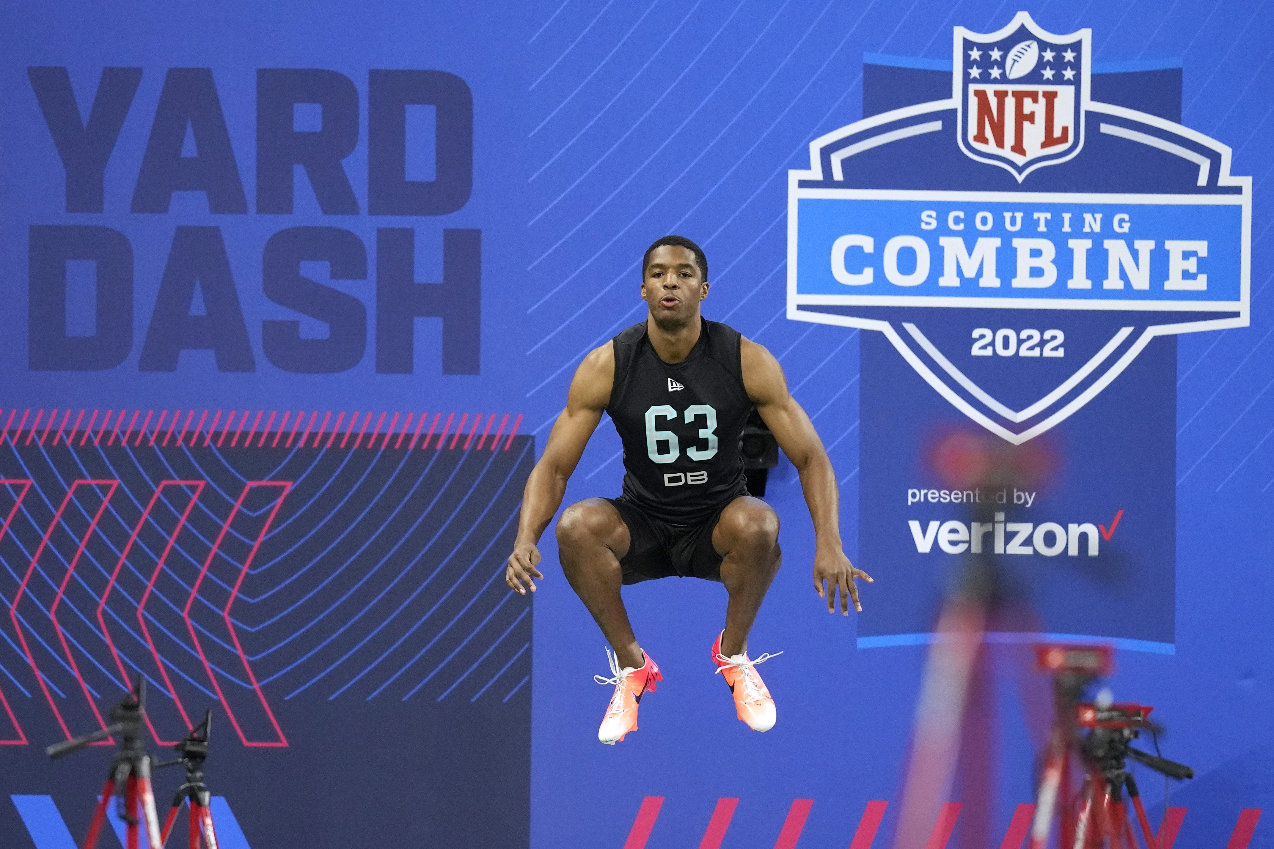 FILE - Baylor defensive back JT Woods prepares to run the 40-yard dash at the NFL football scouting combine, Sunday, March 6, 2022, in Indianapolis. Indianapolis will be keeping the NFL scouting combine for the next two years. At the owners meetings in Atlanta on Tuesday, May 24, 2022, the city that has staged the winter event since 1987 for players entering the draft was granted hosting rights for 2023 and 2024. This was the first time the NFL put the combine up for bidding, with Dallas and Los Angeles also seeking to hold the combine. 