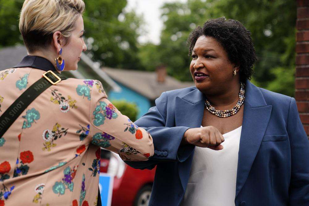 Georgia Democratic gubernatorial candidate Stacey Abrams greets a supporter during Georgia's primary election on Tuesday, in Atlanta.