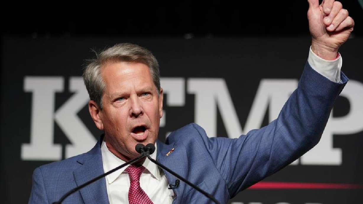 Republican Gov. Brian Kemp waves to supporters during an election night watch party, Tuesday, in Atlanta. Kemp easily turned back a GOP primary challenge Tuesday from former U.S. Sen. David Perdue, who was backed by former President Donald Trump.