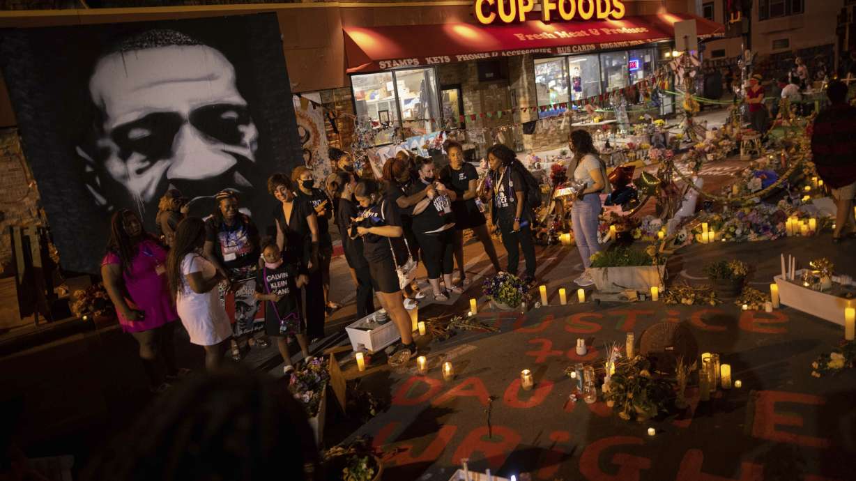 The family of Daunte Wright gathers on the one-year anniversary of George Floyd's death, May 25, 2021, in Minneapolis. A candlelight vigil to honor Floyd's memory at the intersection where he died was among the remembrances scheduled for Wednesday's second anniversary of the Black man's killing at the hands of Minneapolis police officers.