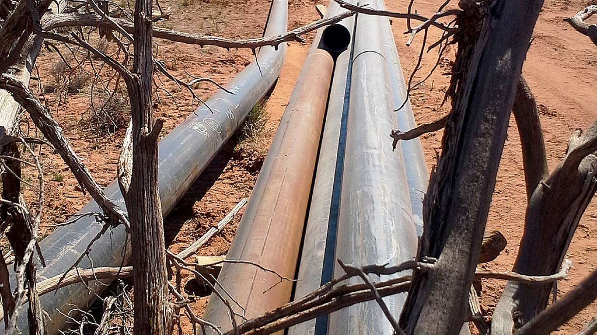 Sections of a pipeline that collects natural gas sit outside Dead Horse State Park near Moab, where oil development is creating conflict with environmentalists. A portion of $250 million allocated under the Bipartisan Infrastructure Law signed last year by President Joe Biden will help Utah tackle legacy pollution.