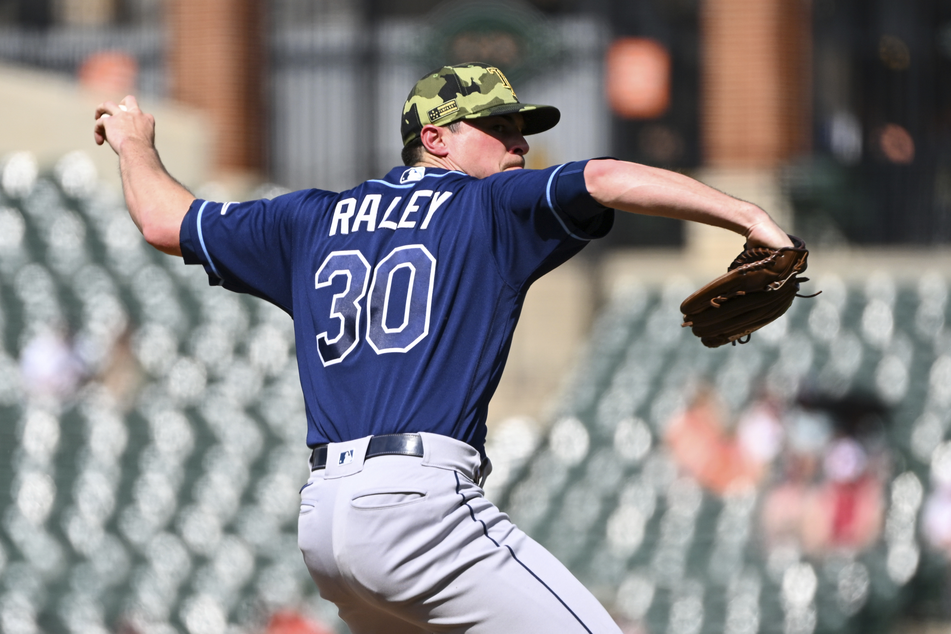 Tampa Bay Rays relief pitcher Brooks Raley (30) throws during the sixth inning of a baseball game against the Baltimore Orioles, Sunday, May 22, 2022, in Baltimore.