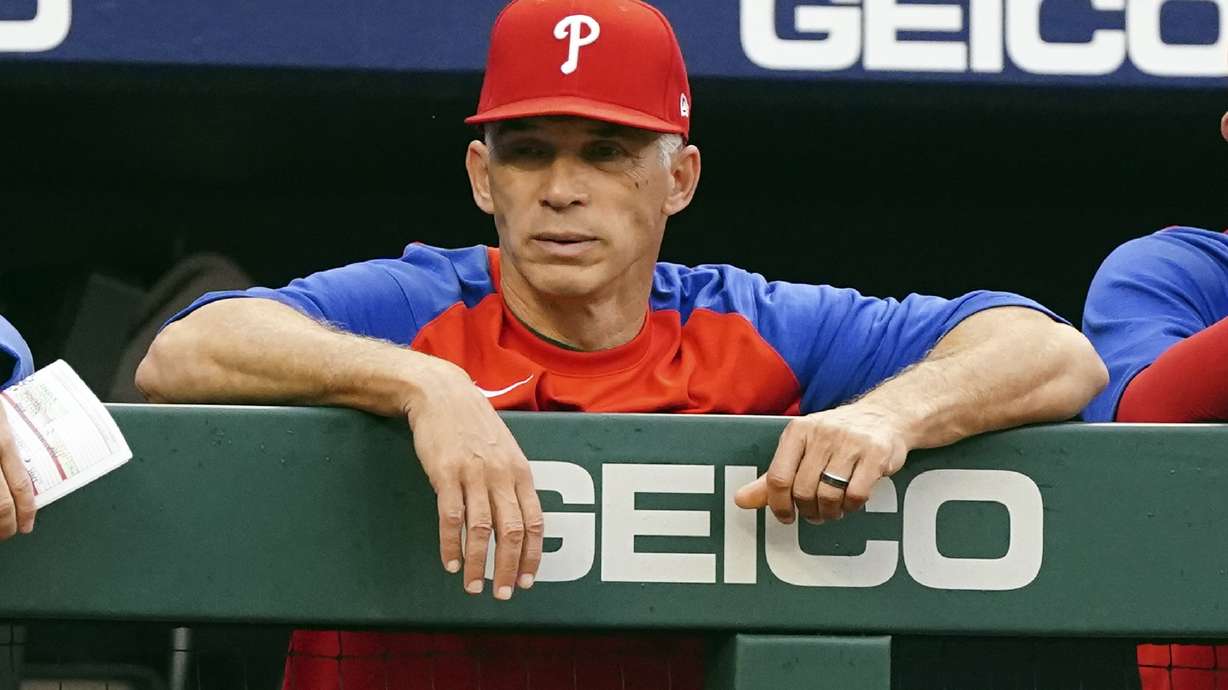 Philadelphia Phillies manager Joe Girardi watches from the dugout during the first inning of the team's baseball game against the Atlanta Braves on Wednesday, May 25, 2022, in Atlanta.