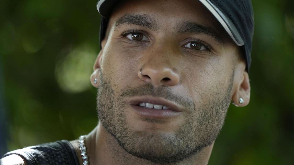 Olympic champion Marcell Jacobs talks during an interview with the Associated Press in Rome, Monday, May 23, 2022. This year could be more memorable for Jacobs than his breakout 2021 when he sprinted from virtual unknown to Olympic 100-meter champion then added another surprising gold at the Tokyo Games with Italy's 4x100-meter relay team. Jacobs tells The Associated Press that "winning these next two big events would mean winning everything there is to win in athletics.".
