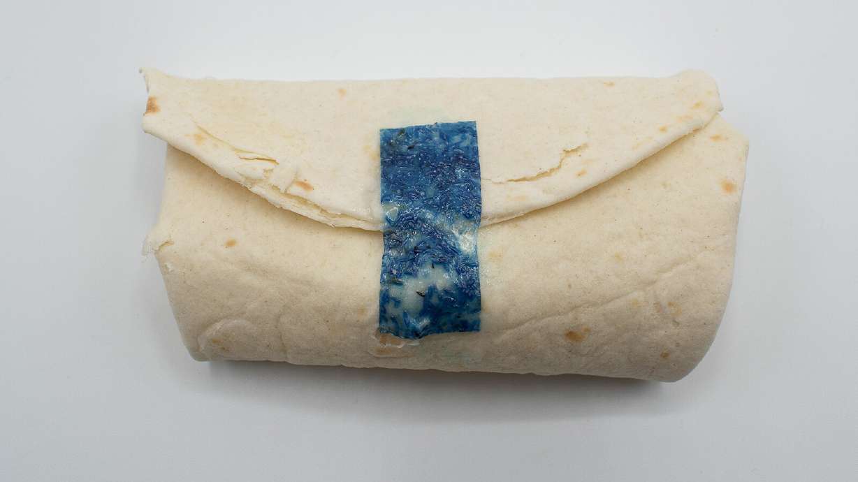 Tastee Tape, seen here, has been dyed blue for visibility but the actual product is clear. The tape was invented by four college students as part of a class project.