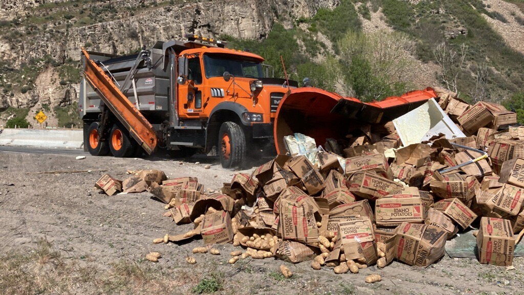 Troopers have reopened I-84 in Morgan County after a semitruck crash spilled potatoes across the road.