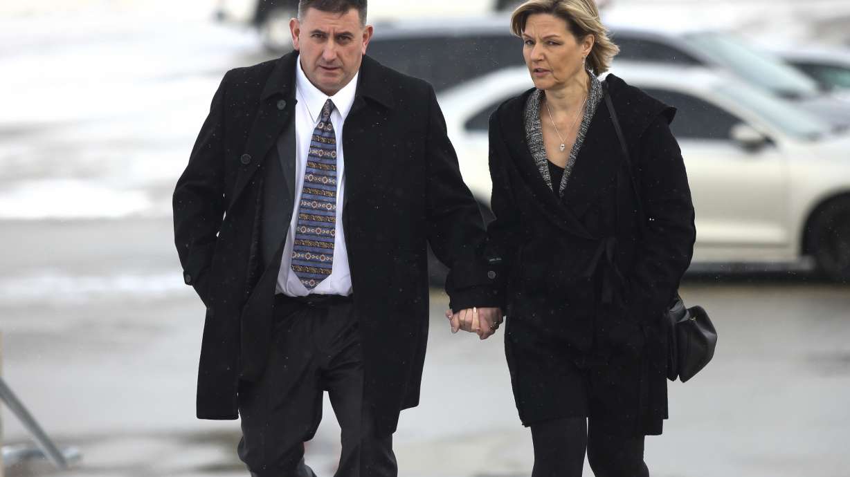 Former Canadian gymnastics coach Dave Brubaker arrives at a courthouse with his wife Elizabeth Brubaker in Sarnia, Ontario, Wednesday, Feb. 13, 2019. A former member of the Canadian national gymnastics team wrote a public letter accusing the country's 2016 Olympic coach of climbing into bed and pressing his body up against her, reaching his hand underneath her shirt and trying to talk her into exposing her breasts. The letter by Abby Pearson Spadafora, 38, revealed the latest in a long series of allegations of sexual, emotional and physical abuse by coaches Dave and Elizabeth Brubaker, who have been banned by Gymnastics Canada.