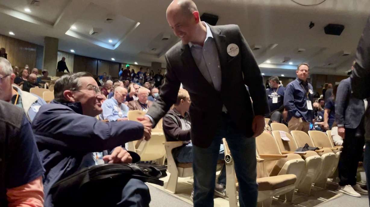Independent Senate candidate Evan McMullin shakes hands with delegates at the Utah Democratic Party convention on April 23 at Cottonwood High School in Murray. McMullin is running for Sen. Mike Lee’s seat as an independent.