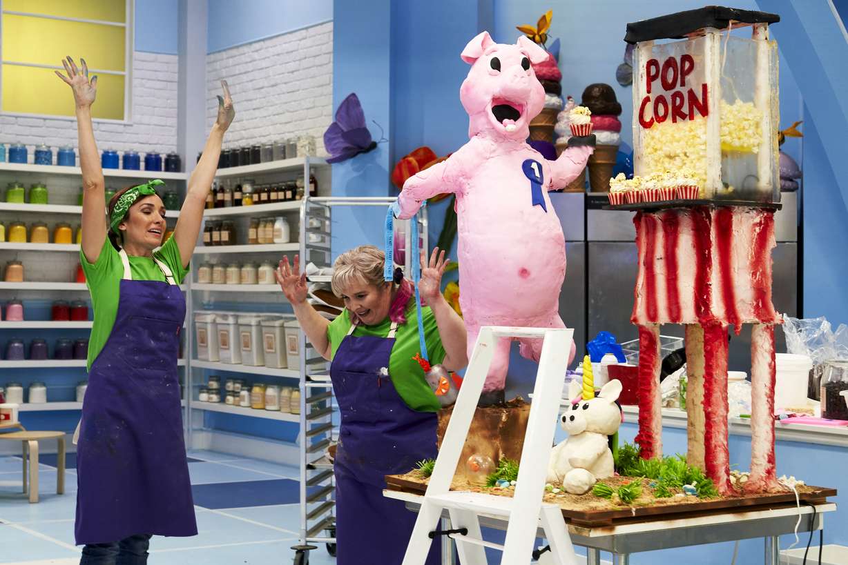 Mandy Clifford, left, and Jennifer Vespar, Emerlie Miller celebrate after winning a competition on Food Network Canada's "The Big Bake."