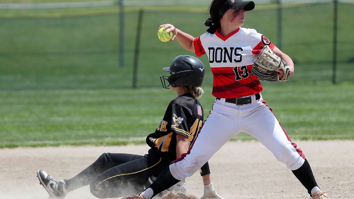 Spanish Fork's Jade Romero turns a play at second base against Wasatch in the winners bracket of the 5A softball championship at the Larry H. Miller Softball Complex in Millcreek, May 24, 2022. Romero led the Dons to a 15-2 win over Lehi in Game 1 of the 5A championship series, Thursday, May 26, 2022 at Gail Miller Field in Provo.