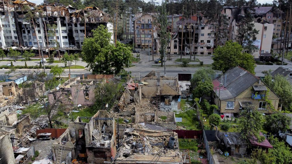 Damaged buildings ruined by attacks are seen in Irpin, on the outskirts of Kyiv, Ukraine, Thursday. Moscow pressed the West on Thursday to lift sanctions against Russia over the war in Ukraine, seeking to shift the blame for a growing food crisis
