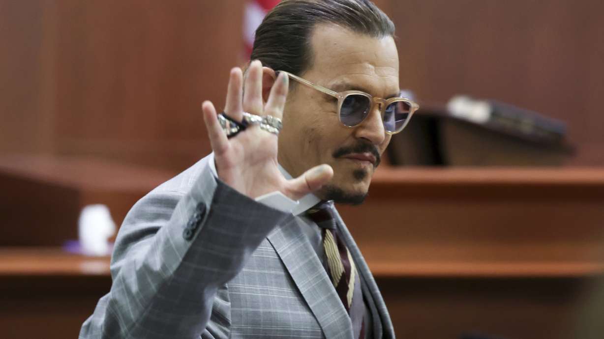 Actor Johnny Depp reacts as he leaves for a break in the courtroom in the Fairfax County Circuit Courthouse in Fairfax, Va., Thursday. Depp sued his ex-wife Amber Heard for libel in Fairfax County Circuit Court after she wrote an op-ed piece in The Washington Post in 2018 referring to herself as a "public figure representing domestic abuse."