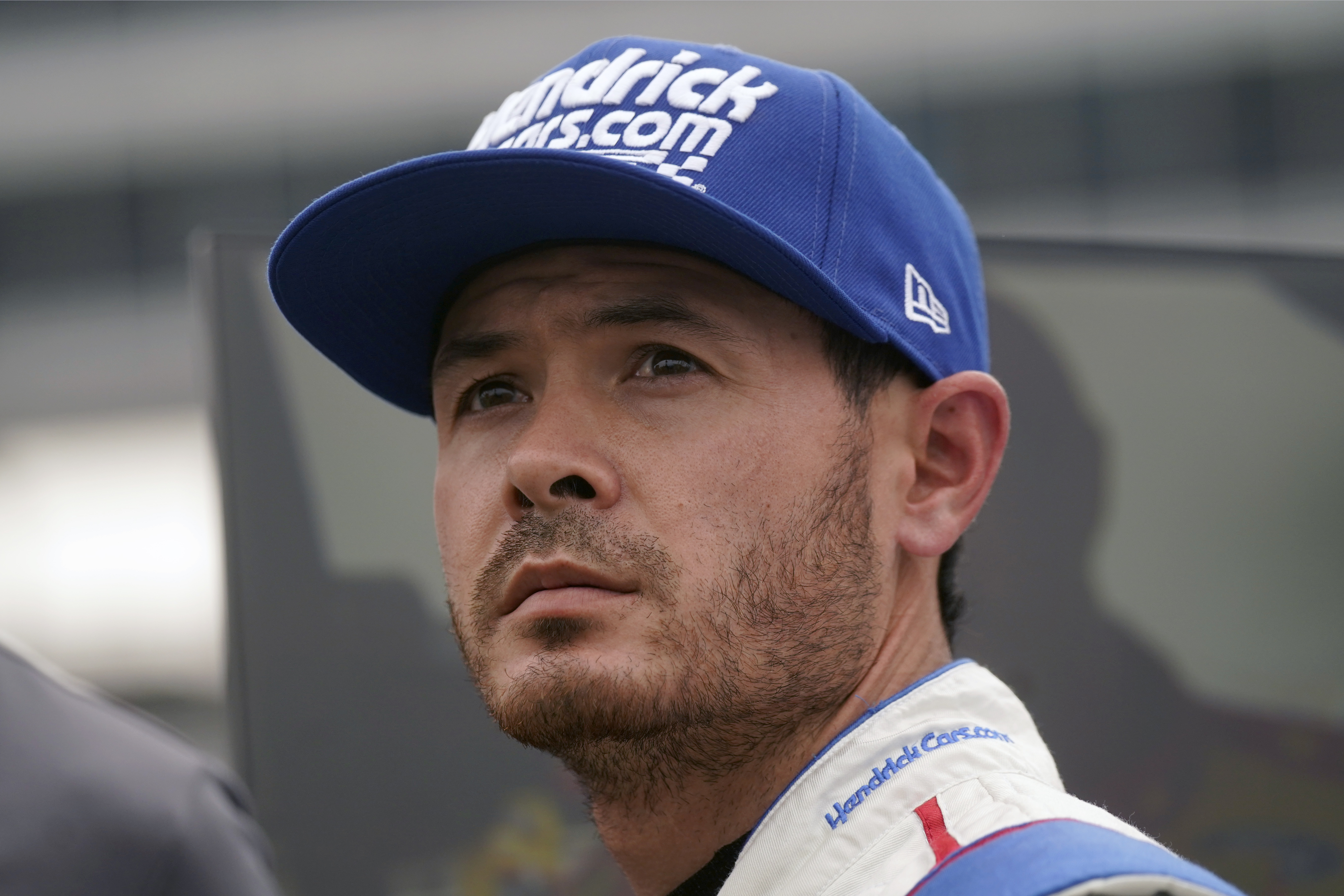 Kyle Larson stands in pit row during qualifying for the NASCAR All-Star Race auto race at Texas Motor Speedway in Fort Worth, Texas, Saturday, May 21, 2022. 