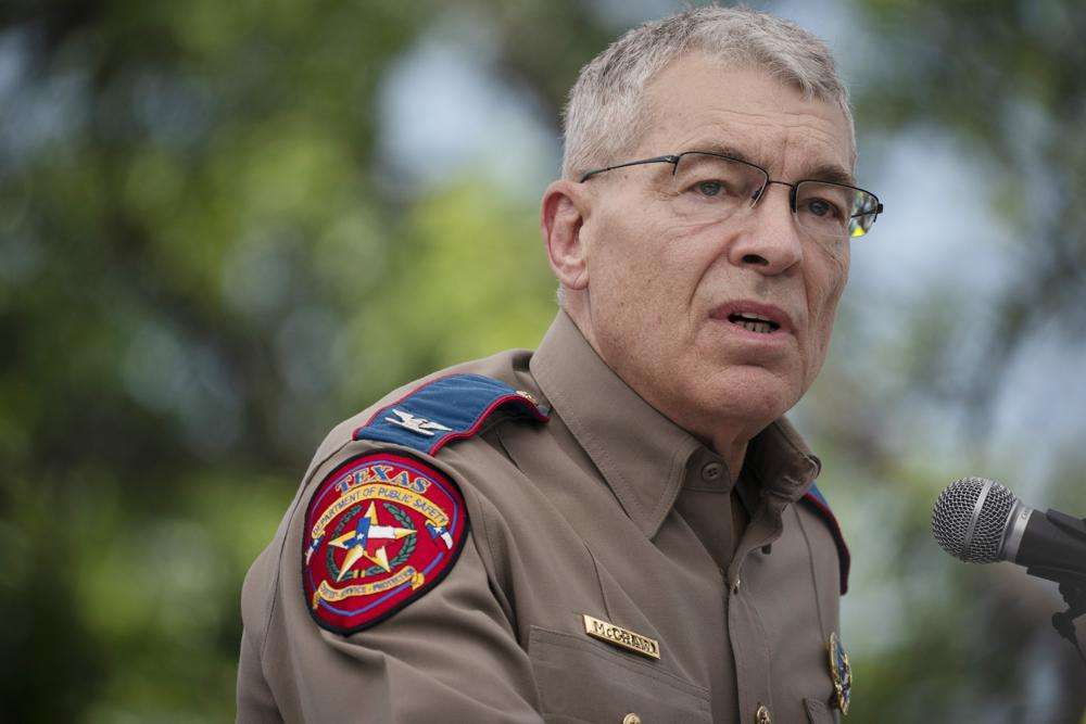 Texas Department of Public Safety Director Steven McCraw speaks during a press conference held outside Robb Elementary School on Friday, in Uvalde, Texas. Nearly 20 officers stood in a hallway outside of the classrooms during this week's attack on a Texas elementary school for more than 45 minutes before agents used a master key to open a door and confront a gunman, authorities said Friday.