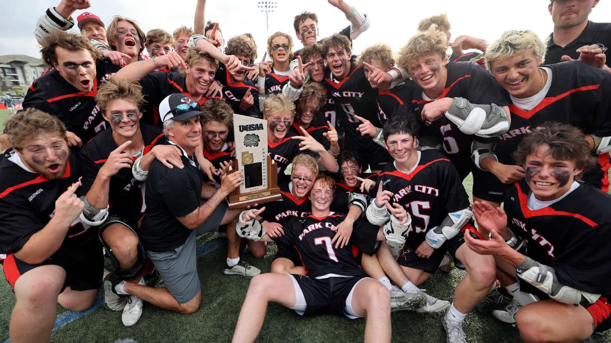 Park City celebrates winning the 5A boys state championship lacrosse game against Olympus at Zions Bank Stadium in Herriman on Friday, May 27, 2022. Park City won 10-9.