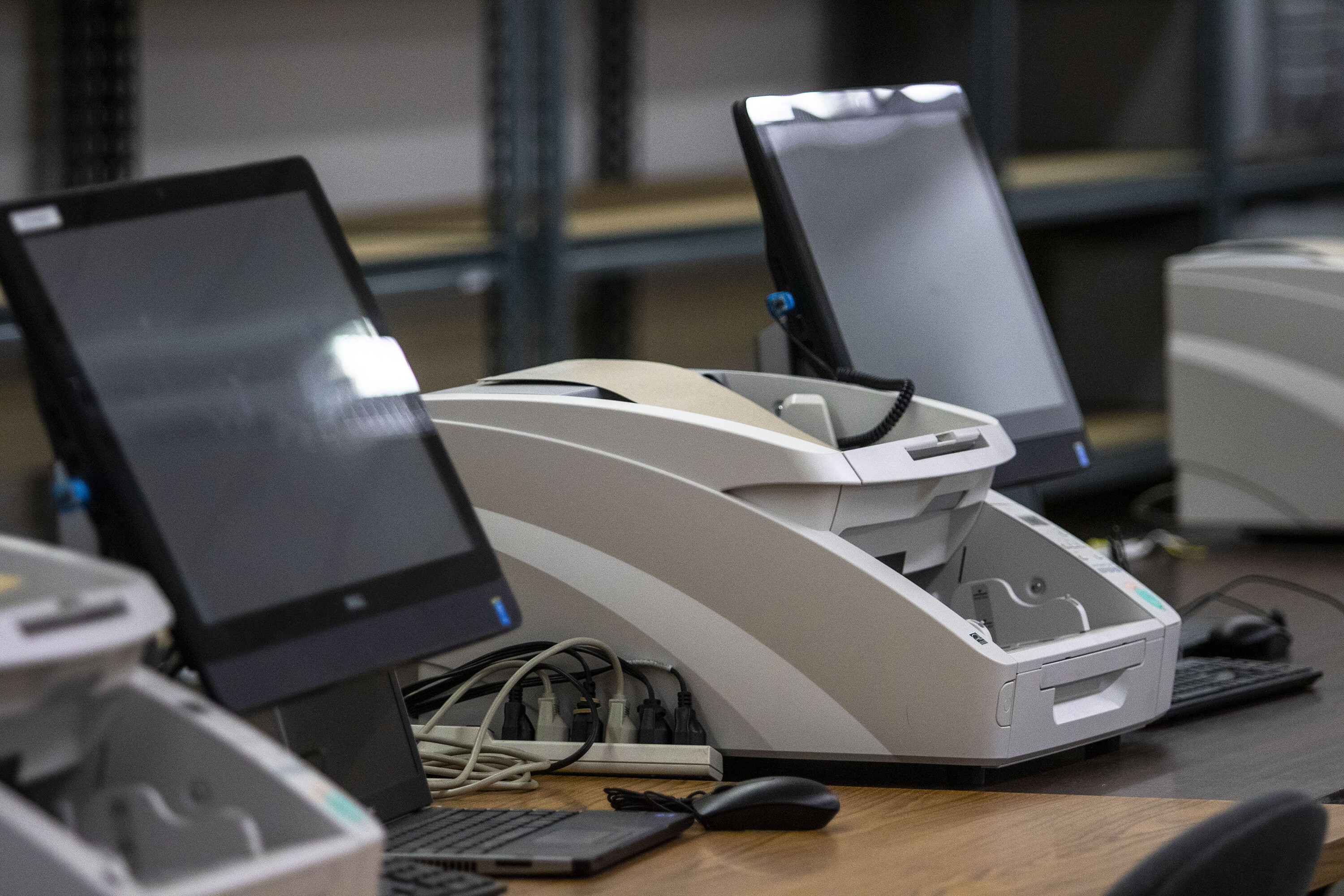 Dominion software flaws haven't been exploited in elections, according to a federal review. A ballot tabulator using Dominion Voting Systems is pictured here on April 27. Federal cybersecurity officials have verified there are software vulnerabilities in certain ballot-marking devices made by Dominion Voting Systems, discovered during a controversial Georgia court case.