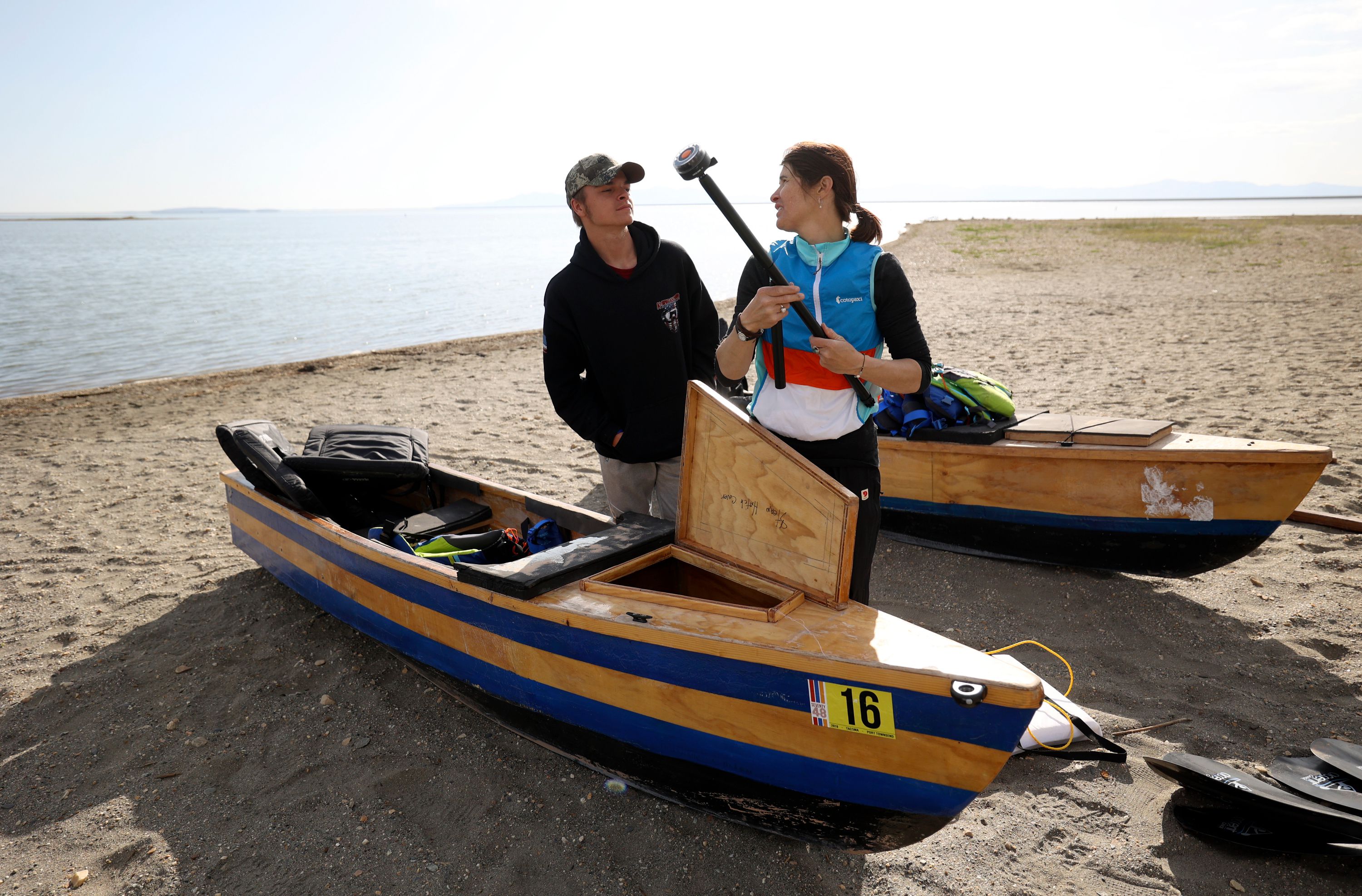 Dillon Dodge, a sophomore at Cyprus High who is legally blind with optic nerve hypoplasia, left, talks with Keri Ostergaard-Welch, Utah Schools for the Deaf and the Blind teacher of the visually impaired, before they set off on an overnight training mission in preparation for the SEVENTY48 boat race at Pelican Beach in Willard Bay in Willard, Box Elder County, on April 29. The SEVENTY48 is a 70-mile boat race between Tacoma and Port Townsend, Wash., that has to be completed in 48 hours.