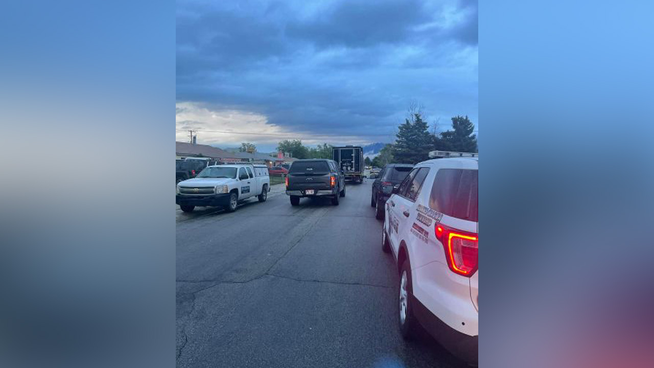 Police investigate the scene of a fatal stabbing at 4550 W. 4920 South in Kearns on Sunday morning. A 20-year-old died and two others were arrested in connection with the stabbing.