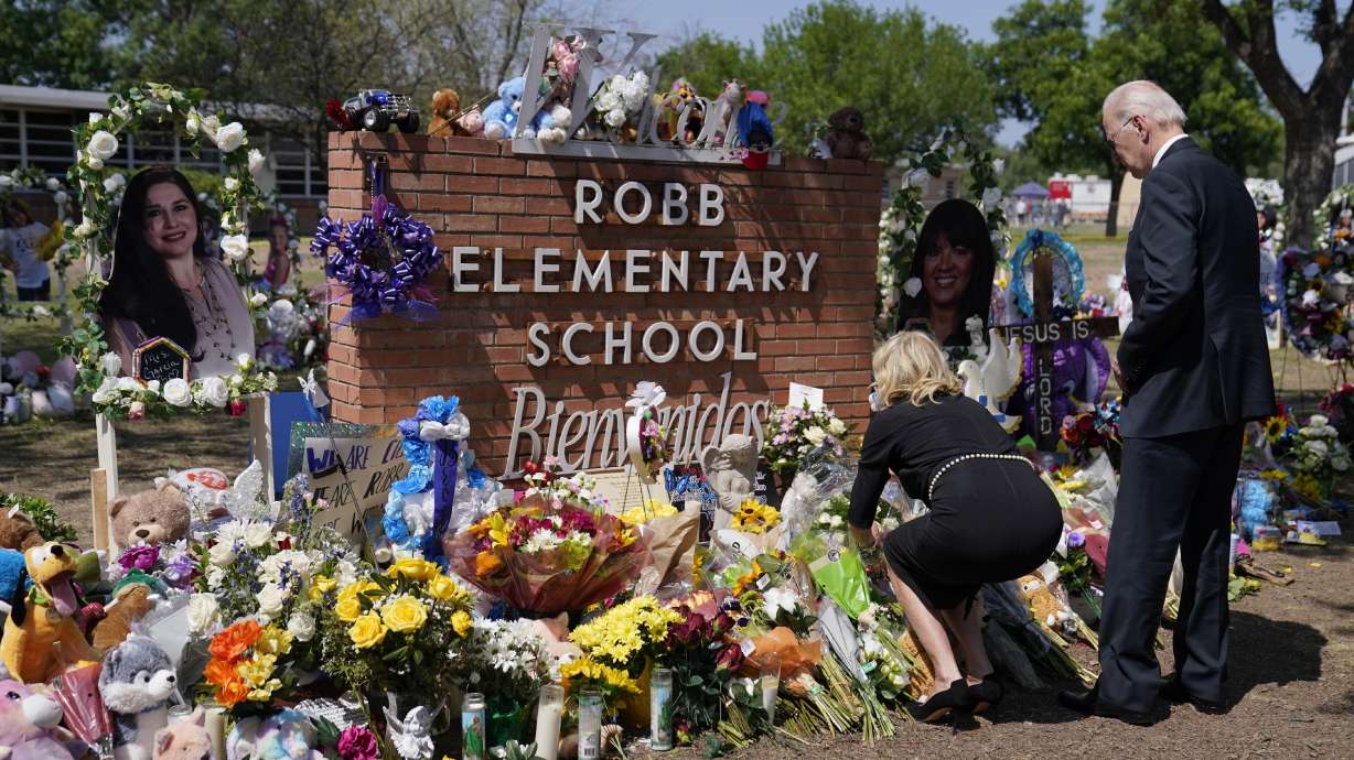 President Joe Biden and first lady Jill Biden visit Robb Elementary School to pay their respects to the victims of the mass shooting, Sunday, in Ulvade, Texas.