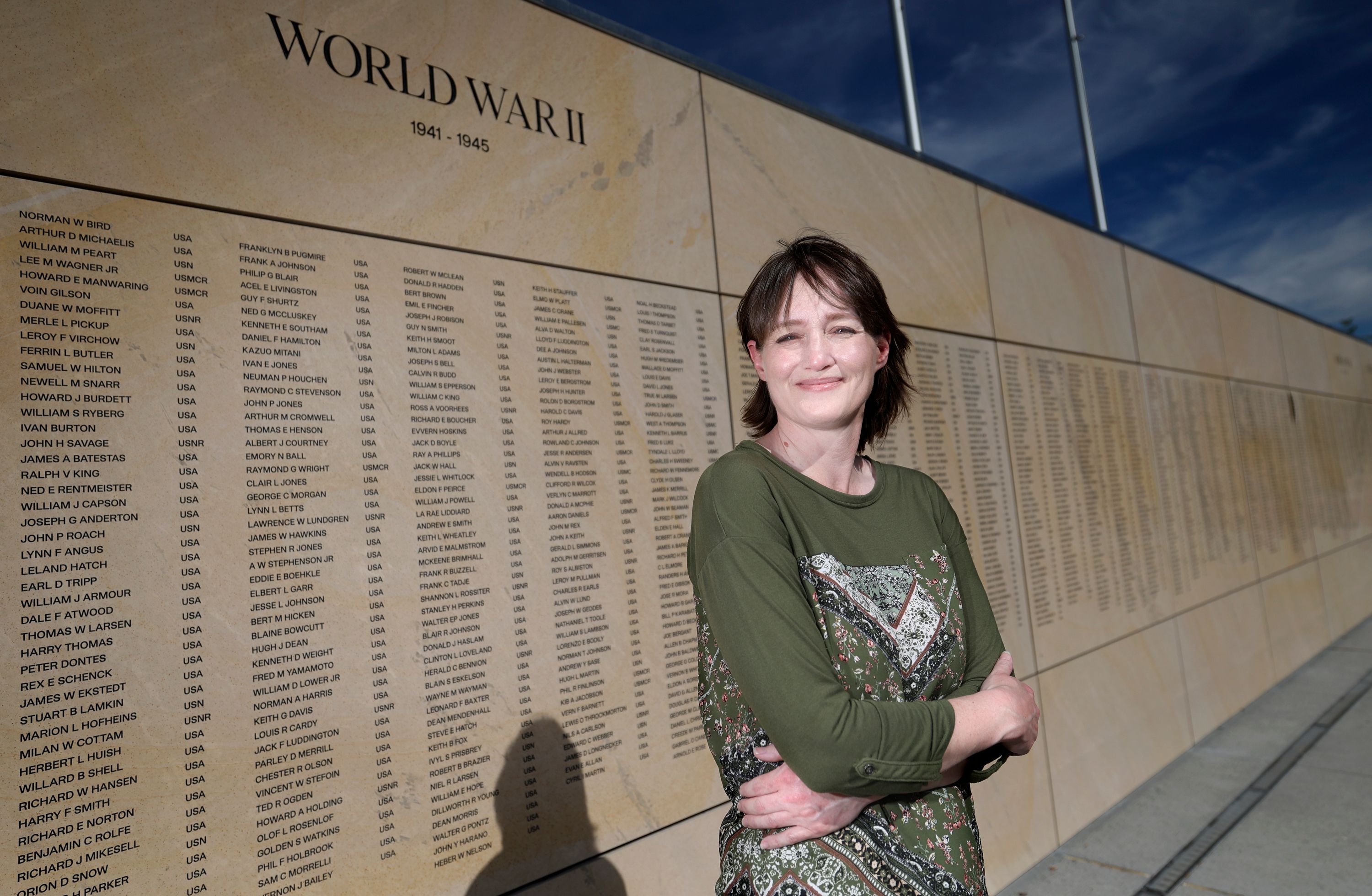 Coby Crump, Utah state director for Stories Behind the Stars: Stories of fallen WWII heroes, poses for a portrait at the Utah Veterans Memorial in West Valley City on Thursday.