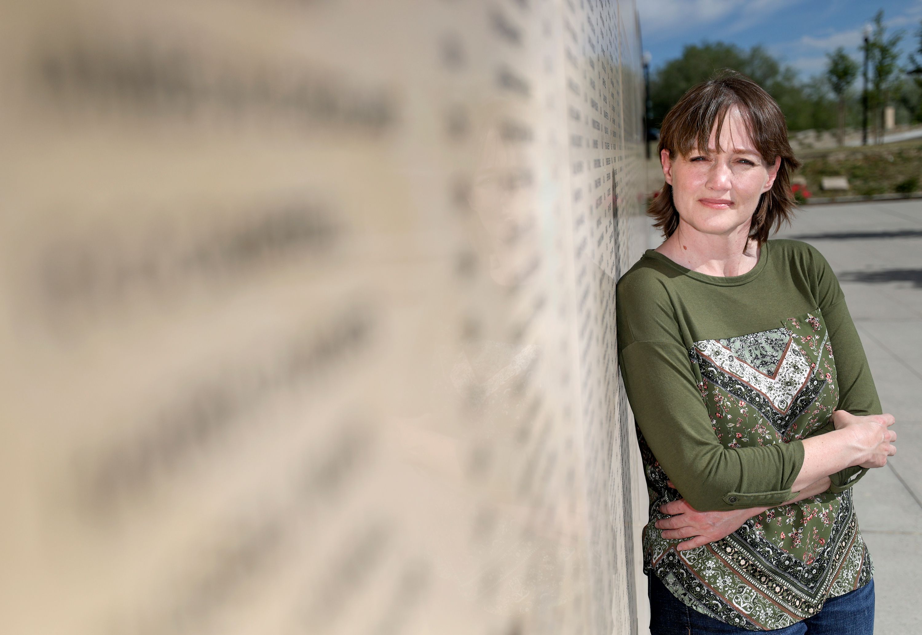 Coby Crump, Utah state director for Stories Behind the Stars: Stories of fallen WWII heroes, poses for a portrait at the Utah Veterans Memorial in West Valley City on Thursday.