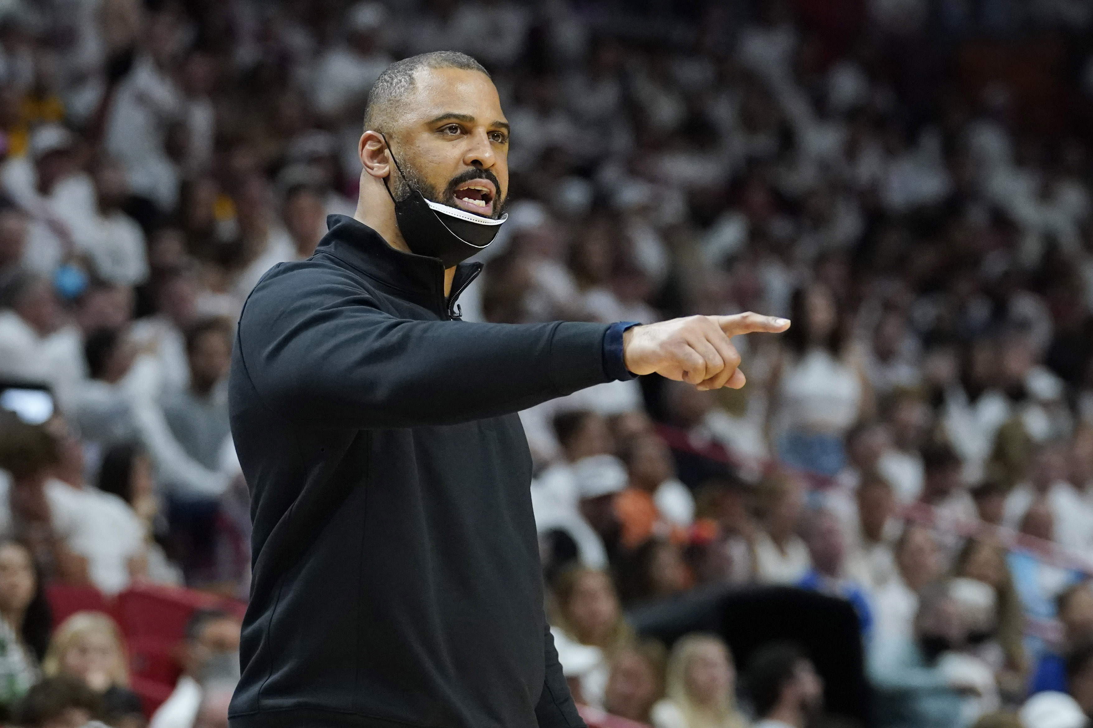 Boston Celtics head coach Ime Udoka gestures during the first half of Game 7 of the NBA basketball Eastern Conference finals playoff series against the Miami Heat, Sunday, May 29, 2022, in Miami. 