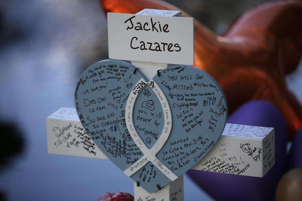 A cross dedicated to Jackie Cazares stands at a memorial site for the victims killed in a shooting at Robb Elementary School in Uvalde, Texas, May 27.