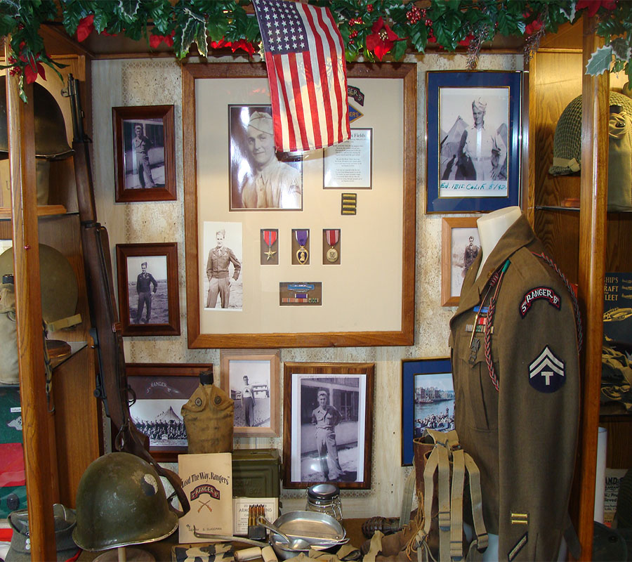 The war room at the Krumenacker home where Dave Krumenacker’s dad’s military items live. The Purple Heart and Bronze Star medals seen pictured are replacements and not the originals.