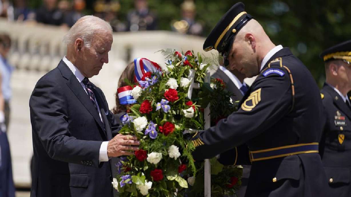 President Joe Biden lays a wreath at The Tomb of the Unknown Soldier at Arlington National Cemetery on Monday, Memorial Day, in Arlington, Va. President Joe Biden says there may some bipartisan support to tighten restrictions on the kind of high-powered weapons used by the gunman in the Texas school shooting.