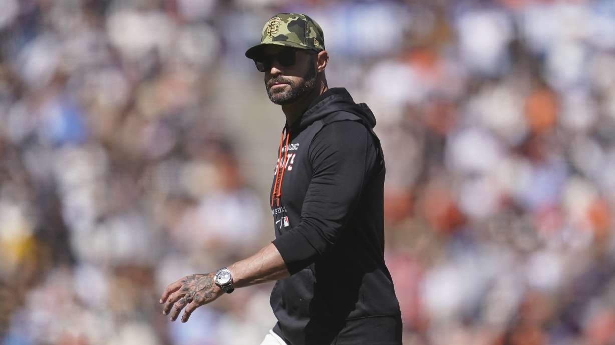 San Francisco Giants manager Gabe Kapler walks to the dugout after making a pitching change during the ninth inning of a baseball game against the San Diego Padres in San Francisco, Saturday, May 21, 2022.