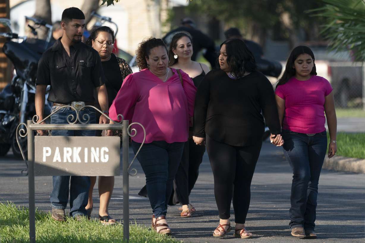 People leave a funeral home after attending a visitation for Amerie Garza, a 10-year-old victim who was killed in last week's elementary school shooting in Uvalde, Texas, Monday.