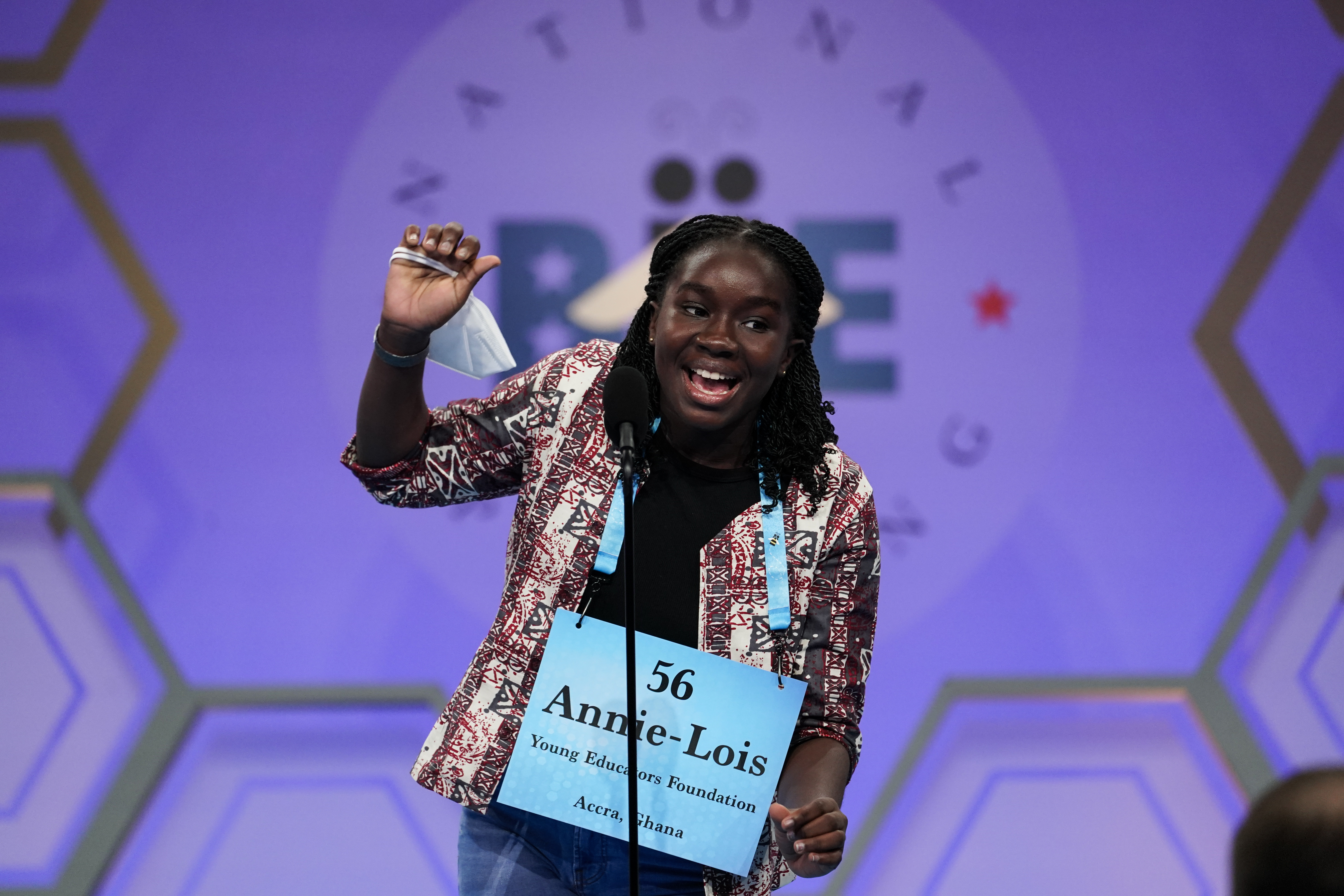 Annie-Lois Acheampong, 13, from Accra, Ghana, reacts during the Scripps National Spelling Bee, Tuesday, in Oxon Hill, Md. 