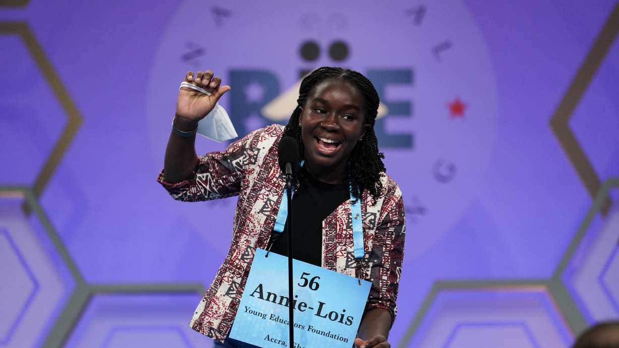 Annie-Lois Acheampong, 13, from Accra, Ghana, reacts during the Scripps National Spelling Bee, Tuesday, in Oxon Hill, Md.