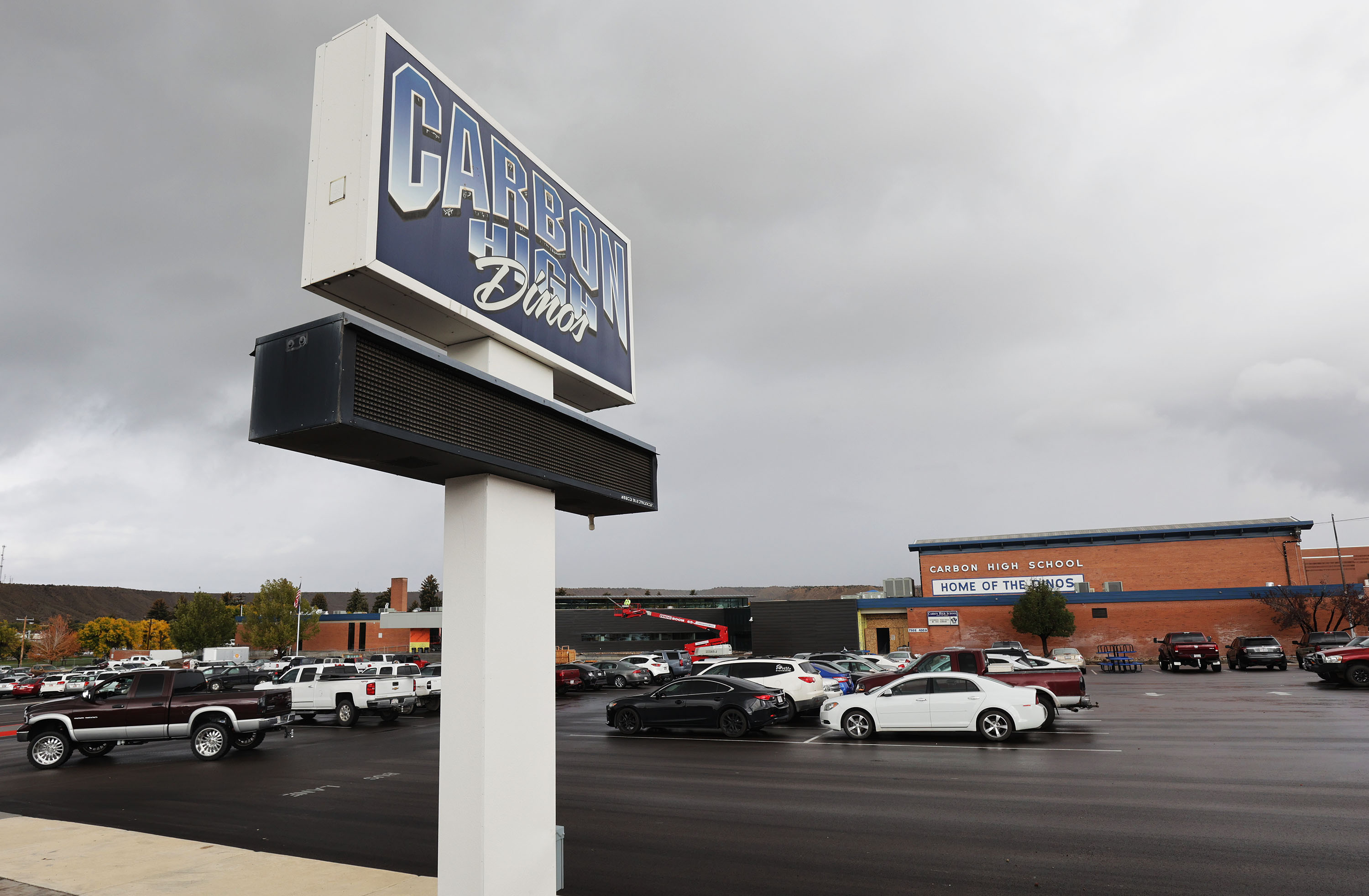 A former coach for the Carbon High School golf team was charged Tuesday with sexually abusing a student for years.