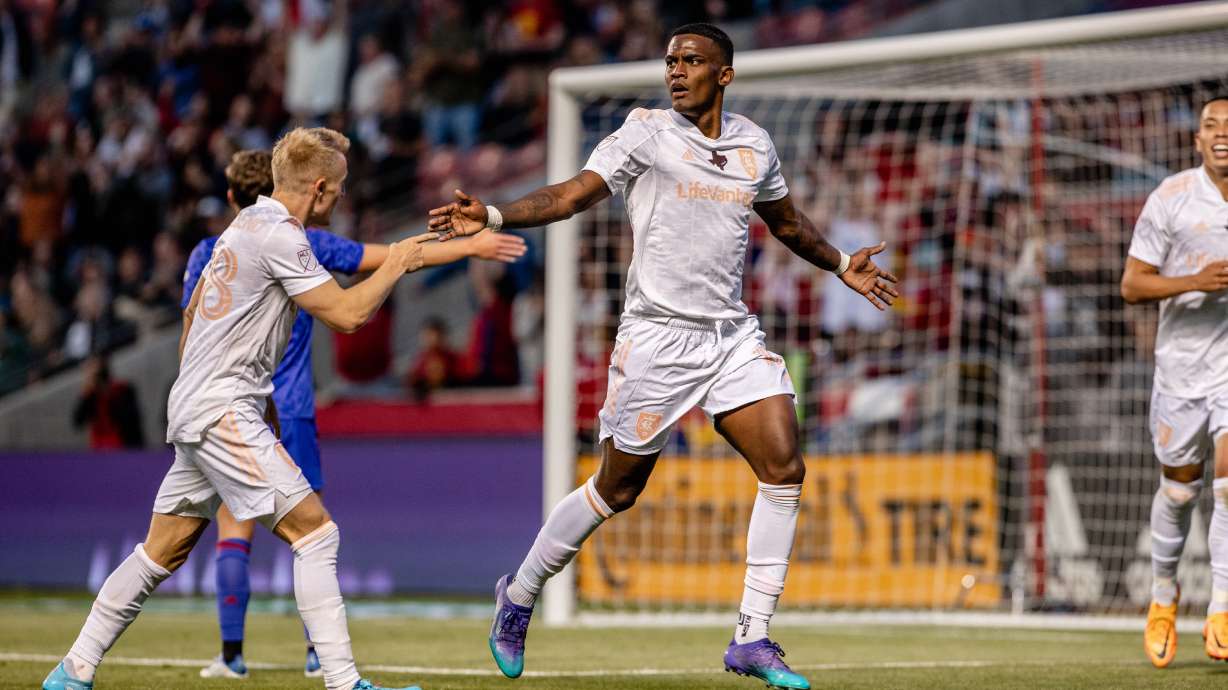 RSL forward Sergio Cordova, middle, celebrates a goal against Houston Dynamo on May 28 at Rio Tinto Stadium.