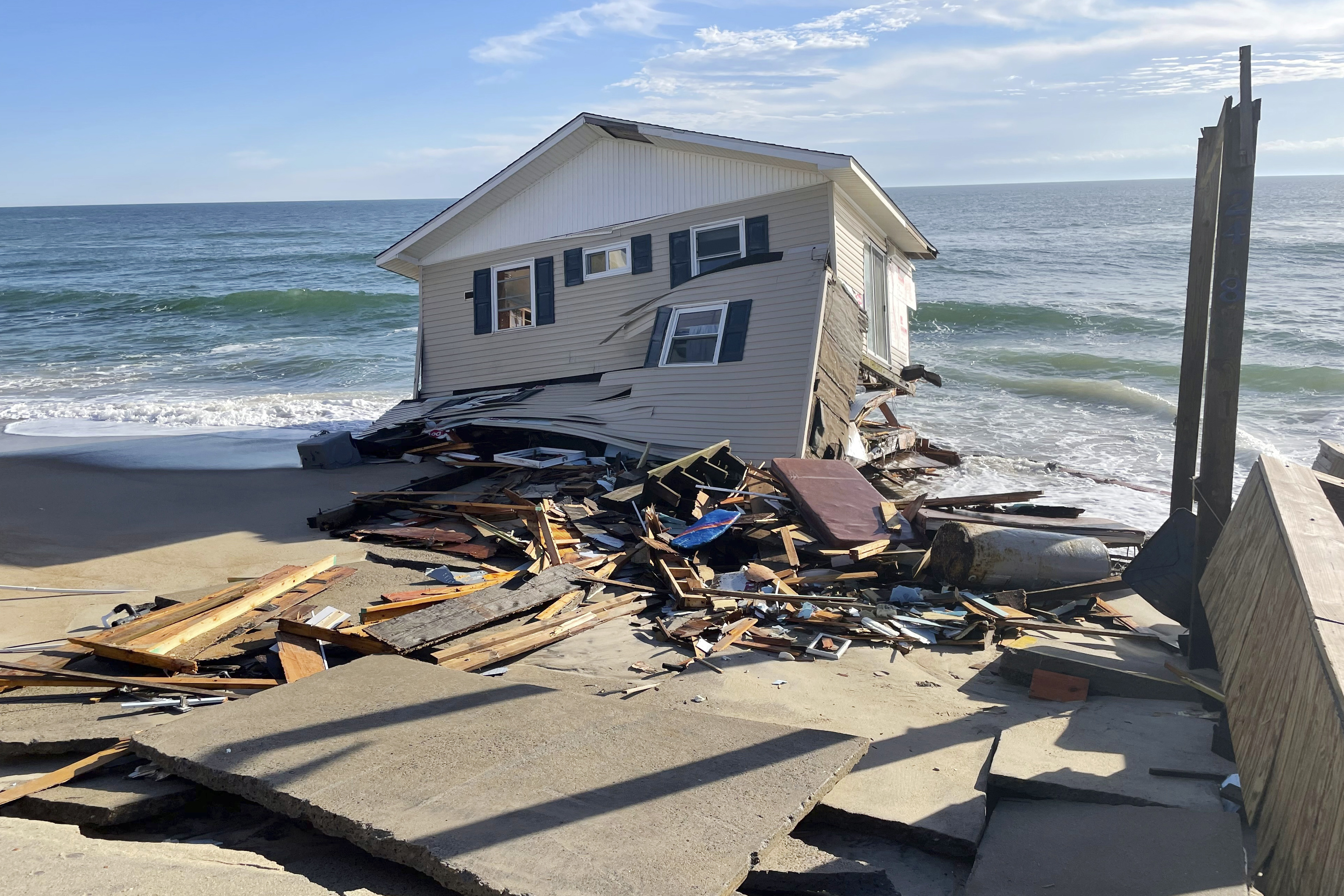 This image shows a collapsed beachfront home in Rodanthe, N.C., on Feb. 9. Federal officials Wednesday announced a new initiative to modernize building codes.