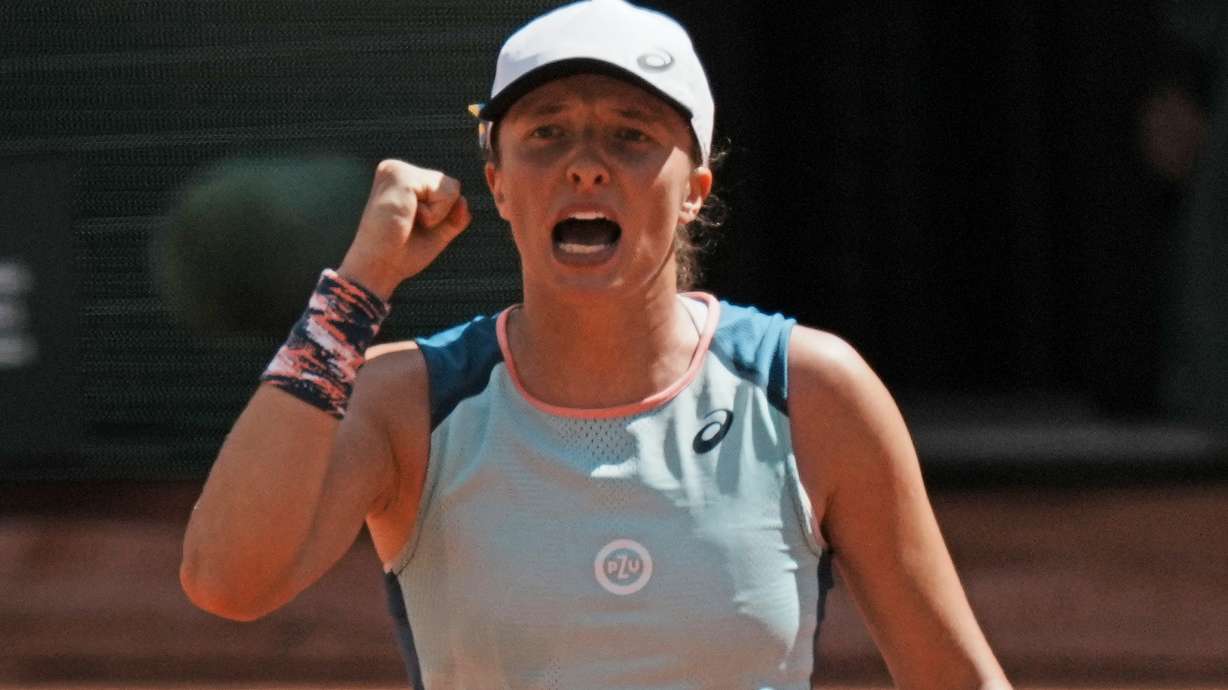 Poland's Iga Swiatek clenches her fist after defeating Jessica Pegula of the U.S. during their quarterfinal match of the French Open tennis tournament at the Roland Garros stadium Wednesday, June 1, 2022 in Paris. Swiatek won 6-3, 6-2.