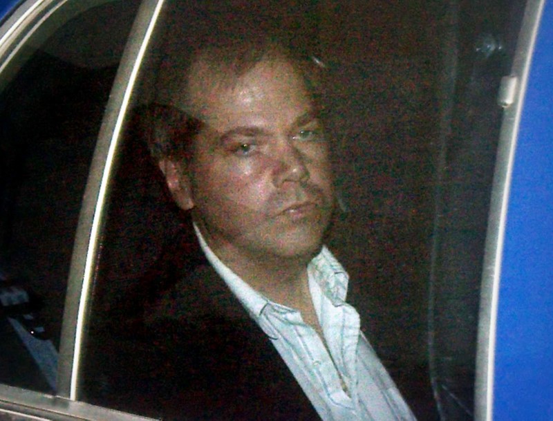 John Hinckley Jr. arrives at the E. Barrett Prettyman U.S. District Court in Washington D.C., Nov.19, 2003. A federal judge on Wednesday granted Hinckley unconditional release from the remaining restrictions he faced, U.S. media reported.