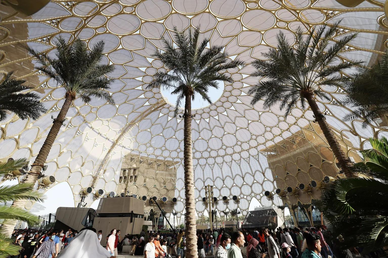 Attendees walk through Expo 2020 in Dubai, United Arab Emirates, on Sunday, March 27. The world expo ended on Thursday, March 31.
