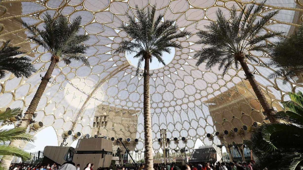 Attendees walk through Expo 2020 in Dubai, United Arab Emirates, on Sunday, March 27. The world expo ended on Thursday, March 31.