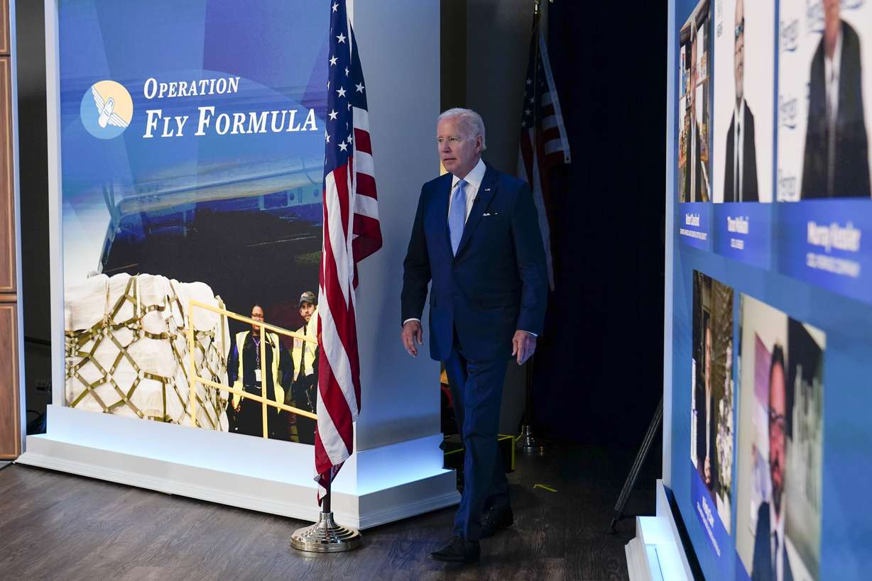 President Joe Biden arrives to meet virtually with infant formula manufacturers from the South Court Auditorium on the White House complex in Washington, Wednesday, as his administration works to ease nationwide shortages by importing foreign supplies and using the Defense Production Act to speed domestic production.